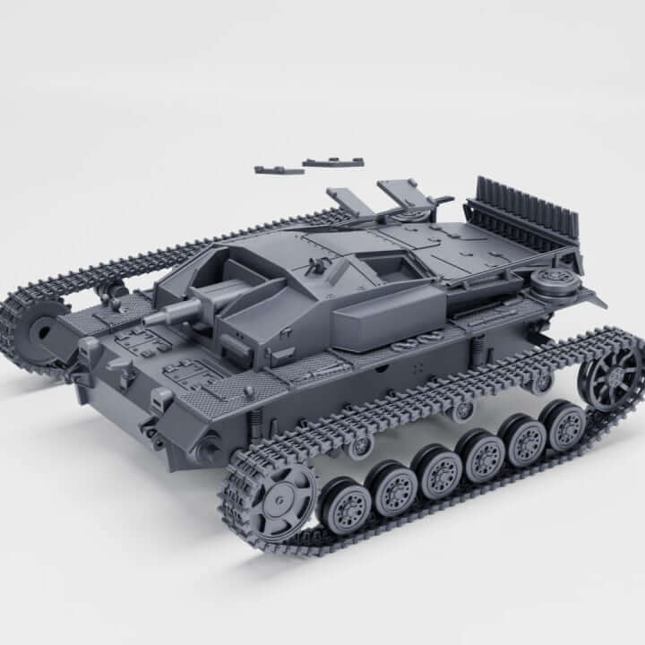 Modell des Sturmgeschütz III Ausf. E mit Winterketten und Zubehörteilen in grauer Farbe.