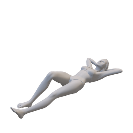 Miniaturfigur einer Frau die im Bikini auf dem Rücken liegt